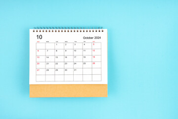 October 2024, Monthly desk calendar for 2024 year on blue background.