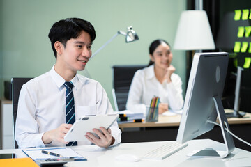 Asian business people working as a good team in the office. Successful teamwork in a meeting, workplace concept.