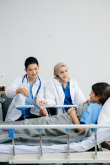 Obraz premium Doctors providing attentive care to a patient in a hospital bed. Compassion, professionalism, and expert healthcare. Ideal for medical