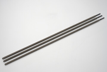 Welding rods/ electrodes with dark color. Welding electrodes with dark coating color for different welding applications on white background. TIG/MIG rods high-quality image. 
