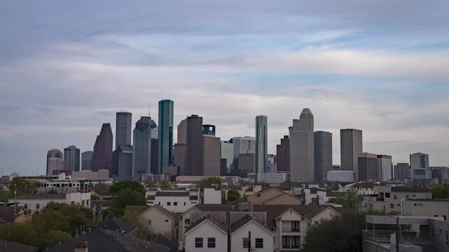 Timelapse of Houston's skyline under shifting clouds, capturing the city's dynamic energy and urban sprawl in a mesmerizing play of light and shadow.