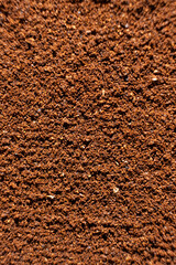 Texture of ground coffee close-up: top view