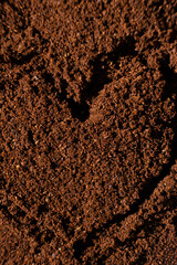 Painted heart on ground coffee, I love coffee.