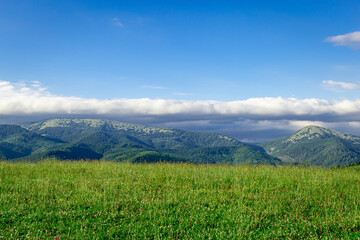 Fototapeta premium Beautiful landscape in the mountains, sky with clouds.
