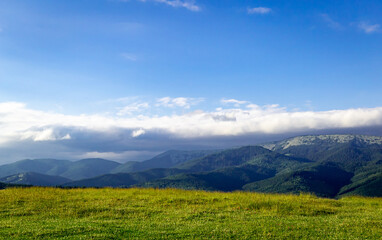 Obraz premium Beautiful landscape in the mountains, sky with clouds.
