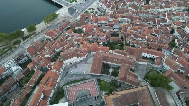 Aerial video of the Mondego River in front of downtown Coimbra, Europe, Portugal