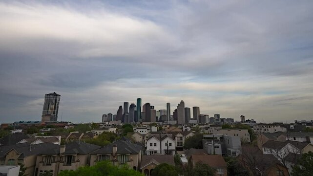 Timelapse of Houston's skyline under shifting clouds, capturing the city's dynamic energy and urban sprawl in a mesmerizing play of light and shadow.