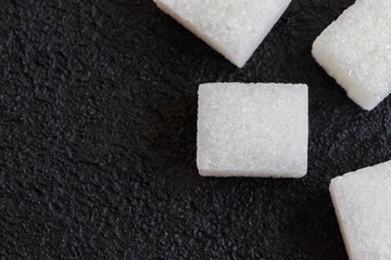 Image of sugar cubes and granulated sugar