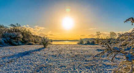Frosty Sunrise Over A Lake
