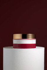 Elegance of quiet luxury. Dark Elegant design of beauty brand.  Skin care product for website and social media.Soft elegance of a cream displayed on a platform. Minimalist product images fo Marketing 