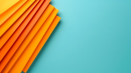 Obraz premium Colorful orange paper sheets stacked on a blue background. Ideal for backgrounds, graphic design, or creative projects. Vibrant and bright.