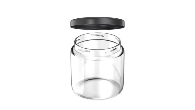 Opening an empty glass jar on a white background