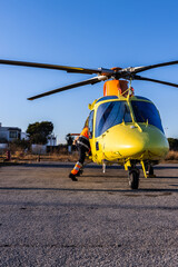 Paramedics running to the medical helicopter