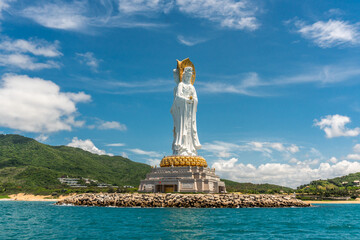 SANYA, HAINAN, CHINA Buddhist deity statue view from the sea