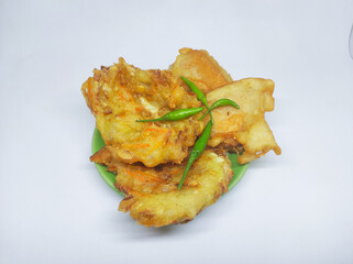 Fried tofu and bakwan with green chilies, typical Indonesian snacks