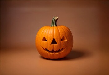 a carved halloween pumpkin on a brown background