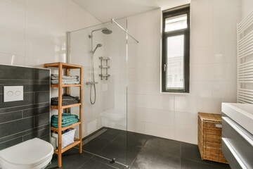 Modern bathroom with walk-in shower and wooden accents