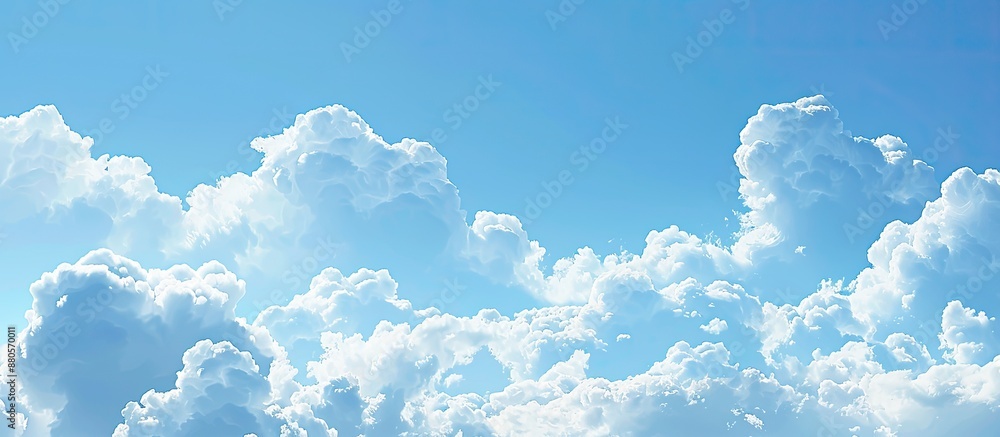 Poster background of a clear blue sky with fluffy white clouds perfect for copy space image