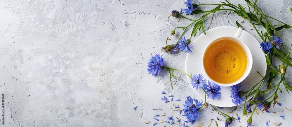 Poster notebook featuring a delightful arrangement of fragrant green tea leaves and vibrant cornflowers on 