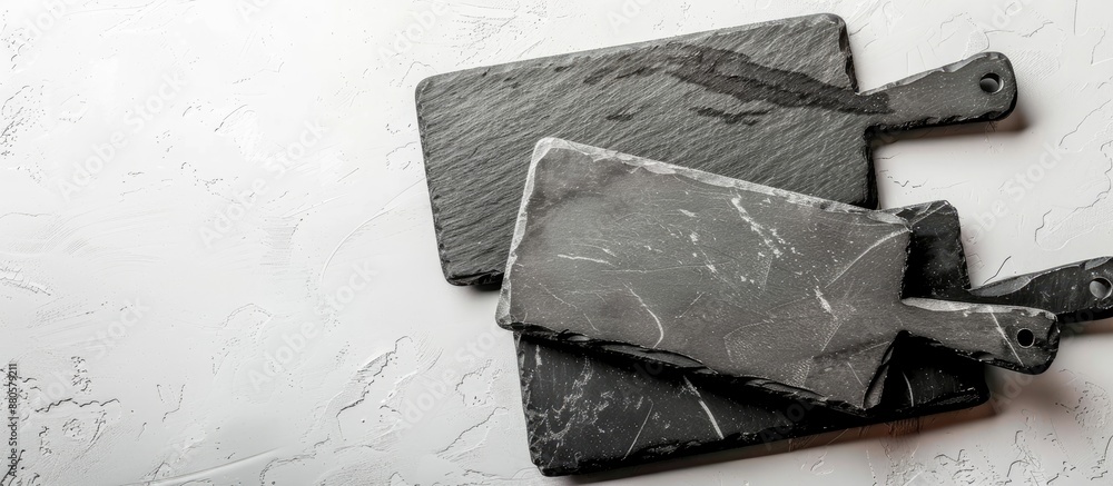 Aufkleber top view of slate cooking boards on a white surface with space for text ideal for a copy space image