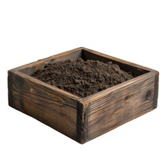 A wooden box filled with dark brown soil, ready for planting.