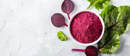 Concept of healthy eating showcased with a white bowl containing superfood beetroot powder on a white background perfect for a copy space image
