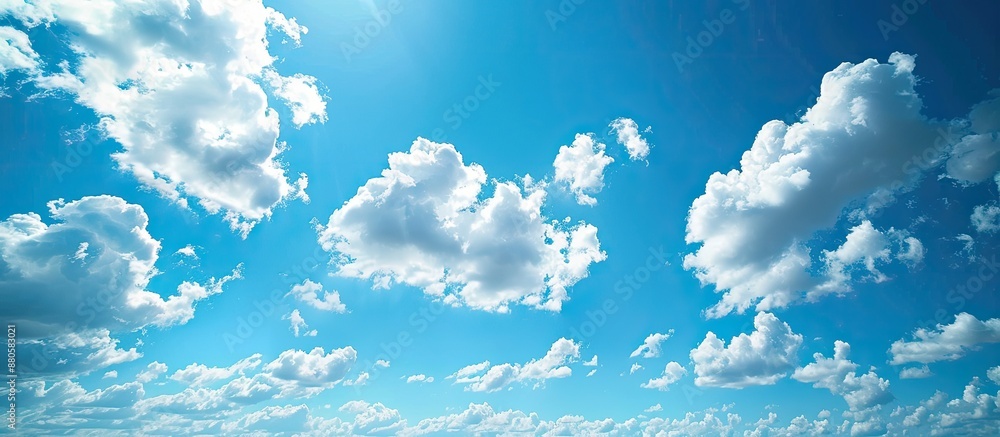 Aufkleber the expansive blue sky with fluffy clouds overhead creates a serene and peaceful copy space image