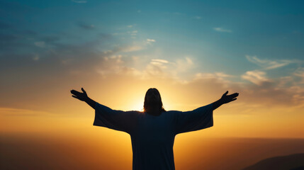 Fototapeta premium '' Jesus Christ standing with outstretched arms against a vibrant sunrise sky 