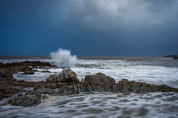Wild, winter storm conditions at Kwaaiwater with ocean waves breaking onto the rocky Hermanus coastline. Whale Coast, Overberg, Western Cape, South Africa.