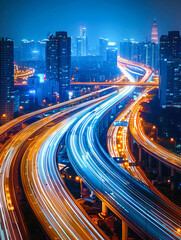 Obraz premium Vibrant urban highway at night with city lights.