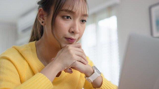 Asia people young woman study hard brownout bored remote work fix coding bug online read data tired sitting at home desk think worry in career job tough stress workforce mental health issue illness.