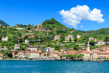 Naklejka premium City view of Menaggio from Lake Como in Italy