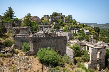 Ruins of the Abandoned Village of Kayakoy on a sunny day in Fethiye, Mugla Province, Turkey