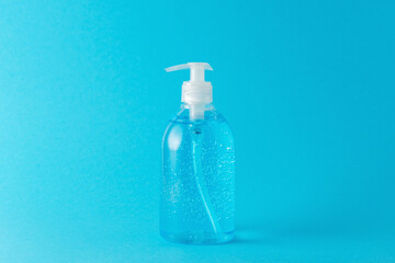 Hand sanitizer in a bottle on a bright background. Coronavirus prevention concept.