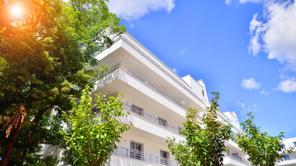 Eco apartment building saving energy and fresh air concept. European residential architecture...