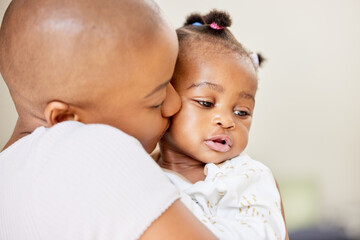 Mom, care and baby kiss for love relationship, development and hug for security in family home. Mother, newborn girl and embrace with child, safety and happy bonding together for healthy growth