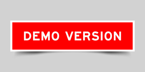 Square sticker label with word demo version in red color on gray background