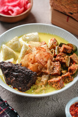 Lontong sayur or vegetable rice cake is an Indonesian traditional rice dish