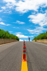 Fototapeta premium Follow the road, over the hills and into another world.