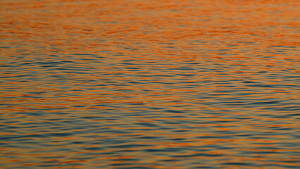 Reflection Of Golden Sunlight Over Sea Or Ocean. Beautiful Natural Background. Slow motion.