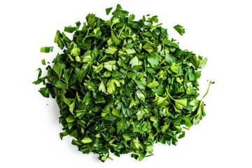 Obraz premium Fresh parsley chopped and placed on a clean white surface, ideal for photography or culinary use