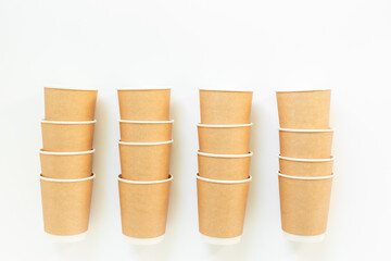 Stack of recyclable coffee paper cups, top view. Eco-friendly zero waste products