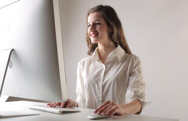 young woman works with a computer