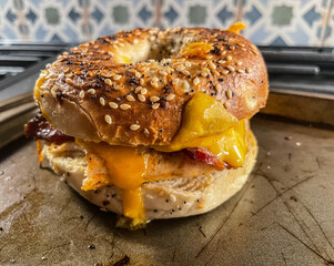 breakfast bagel sandwich with bacon egg and cheese