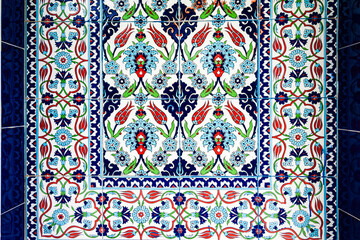 Colorful traditional Turkish ceramic tile pattern with floral motifs, texture, background.
