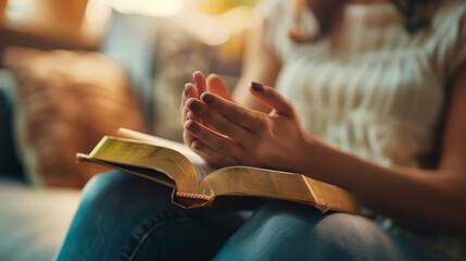 Obraz premium Woman hands, bible, and prayer in spiritual house, pure gospel, and God worship. Closeup woman praying, studying religion, or praising Jesus Christ in tranquility with Christian books.