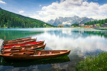 Boats on the Lake Misurina and Dolomites mountains. Veneto, Italy