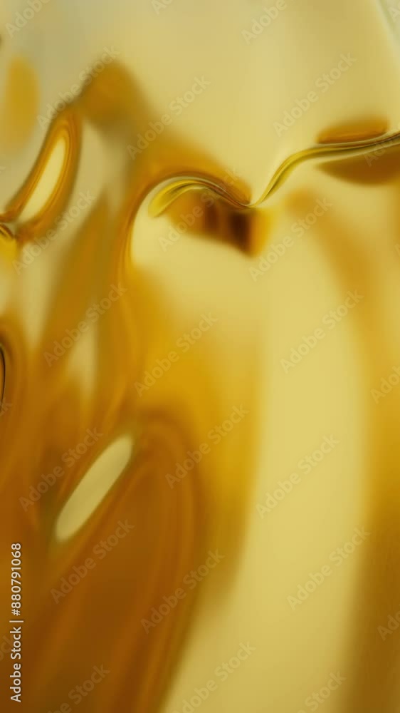 Poster abstract gold liquid. the background is golden, with a wave-like pattern. the texture appears to be 