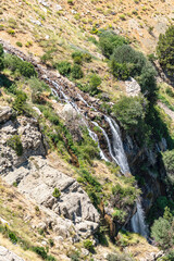 The scenic views of Gömbe Uçarsu Waterfall which  fly like a white cloud down the rocks at an altitude of about 50 meters, with a cave underneath, Gömbe, Kaş, Antalya
