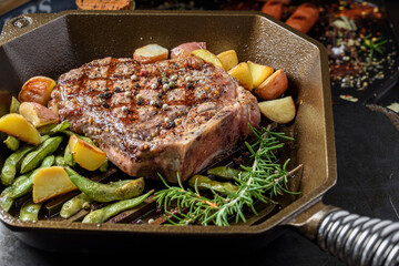 Grilled Steak with roasted garlic.